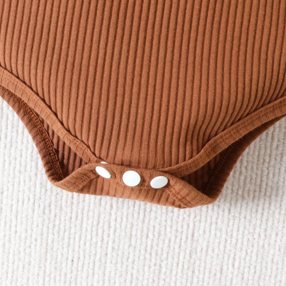 Set estivo con body a costine, shorts e cerchietto - immagine 6