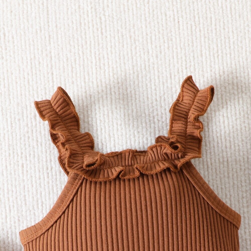 Set estivo con body a costine, shorts e cerchietto - immagine 7